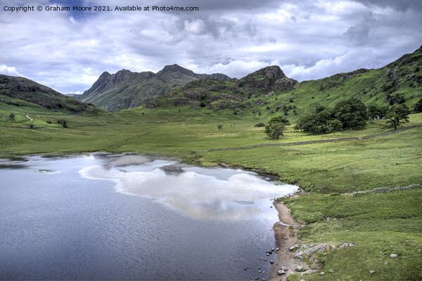 Blea Tarn the Langdale Pikes and Side Pike Picture Board by Graham Moore
