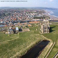 Buy canvas prints of Whitby town and Abbey headland square format by Graham Moore