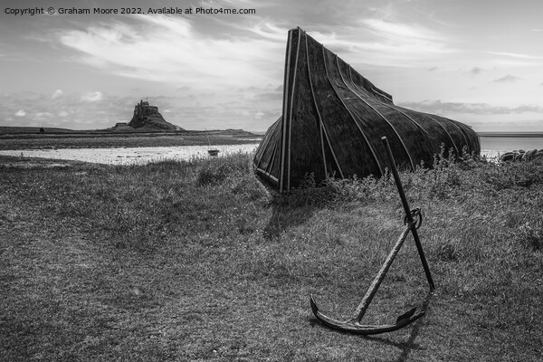 lindisfarne castle from the boat sheds monochrome Picture Board by Graham Moore
