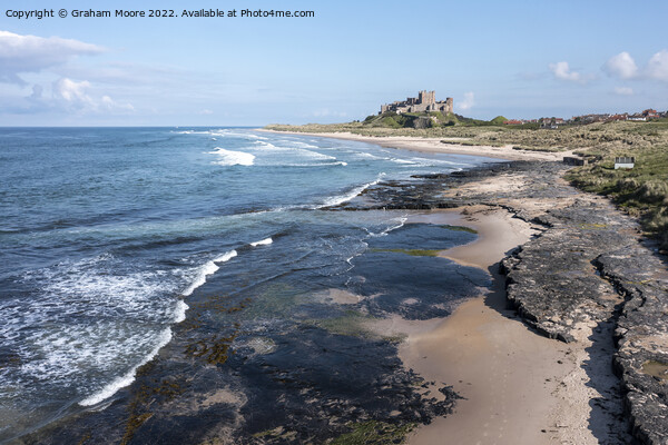 Bamburgh Castle from the north elevated Picture Board by Graham Moore