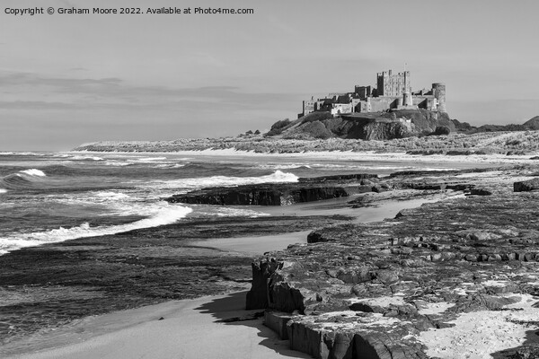 Bamburgh Castle from the north monochrome Picture Board by Graham Moore