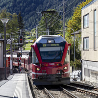 Buy canvas prints of Train approaching Poschiavo station by Graham Moore