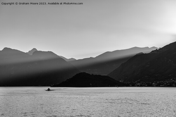Lake Como sunbeams monochrome Picture Board by Graham Moore