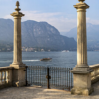 Buy canvas prints of Lake Como terrace  and motorboat by Graham Moore
