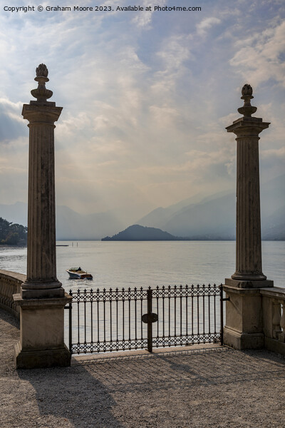 Lake Como terrace at sunset Picture Board by Graham Moore