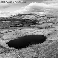 Buy canvas prints of Tewet Tarn Skiddaw and Blencathra monochrome by Graham Moore