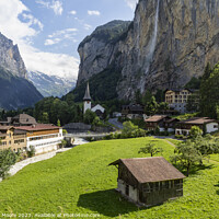 Buy canvas prints of Lauterbrunnen village and Staubbach falls by Graham Moore