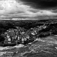 Buy canvas prints of Robin Hoods Bay evening moody sky monochrome by Graham Moore