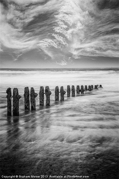Breakwater and clouds Picture Board by Graham Moore