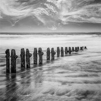 Buy canvas prints of Breakwater and clouds by Graham Moore