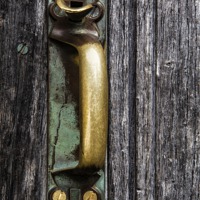 Buy canvas prints of Rustic door handle by Graham Moore
