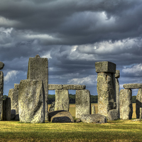 Buy canvas prints of Stonehenge in gathering storm by Graham Moore