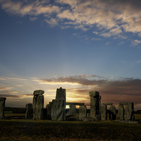 Buy canvas prints of Stonehenge summer solstice sunrise by Graham Moore