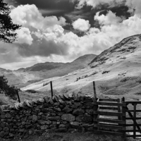 Buy canvas prints of Blake Rigg and Tilberthwaite Fells by Graham Moore