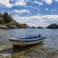 Buy canvas prints of Isola Bella boat by Graham Moore