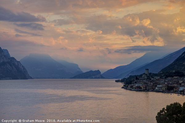 Malcesine at sunrise Picture Board by Graham Moore