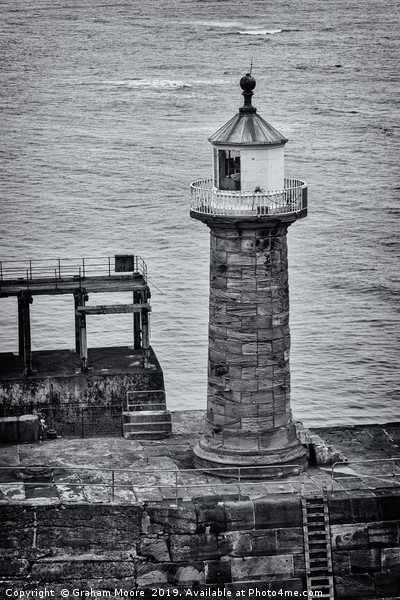 Whitby pier lighthouse Picture Board by Graham Moore