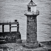 Buy canvas prints of Whitby pier lighthouse by Graham Moore