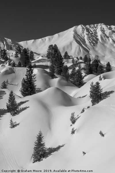 Undulating snowy mountainscape monochrome Picture Board by Graham Moore