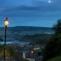 Buy canvas prints of Robin Hoods Bay street evening by Graham Moore