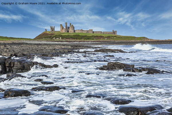 Dunstanburgh Castle from the south Picture Board by Graham Moore