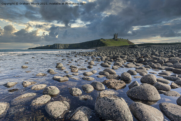 Dunstanburgh Castle from the north Picture Board by Graham Moore