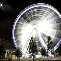 Buy canvas prints of Liverpool wheel under a full moon starburst by Paul Farrell Photography