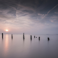 Buy canvas prints of  Hazy sunset at Caldy beach by Paul Farrell Photography