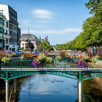 Buy canvas prints of  Colourful Bridge at Quimper in Brittany, France by Edward Liddell