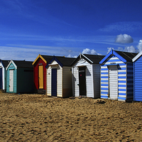 Buy canvas prints of Southwold Beach Huts by Karen Magee