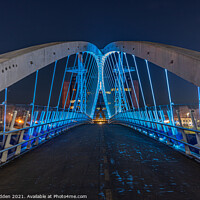 Buy canvas prints of Salford Quays Footbridge at Night by Paul Madden