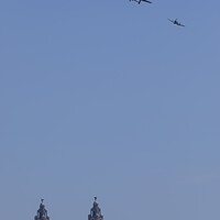 Buy canvas prints of Battle of Britain over the Liver Building by Paul Madden