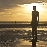 Buy canvas prints of Crosby Beach Iron Man Sunset by Paul Madden