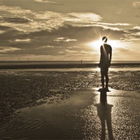 Buy canvas prints of Crosby Beach Sepia Sunset by Paul Madden