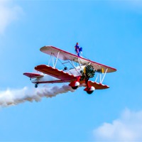 Buy canvas prints of Wingwalker at Southport airshow by Paul Madden