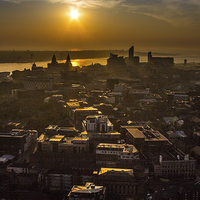 Buy canvas prints of Sunset over Merseyside by Paul Madden