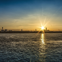 Buy canvas prints of Sunrise over the city by Paul Madden