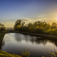 Buy canvas prints of Canalside sunset by Paul Madden