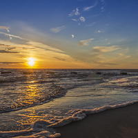 Buy canvas prints of Sunset over the sea by Paul Madden