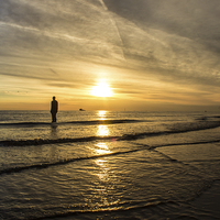 Buy canvas prints of Sunset at Crosby Beach by Paul Madden