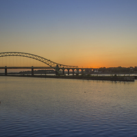 Buy canvas prints of Runcorn Bridge sunset by Paul Madden