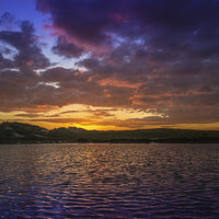 Buy canvas prints of Sunset over the boating lake by Paul Madden