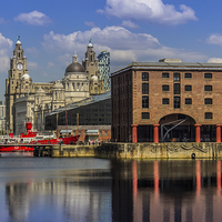 Buy canvas prints of  The Albert Dock and Royal Liver Building by Paul Madden