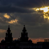 Buy canvas prints of Liver Building and stormy skies by Paul Madden