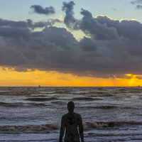 Buy canvas prints of Solitary Iron Man at Crosby Beach by Paul Madden