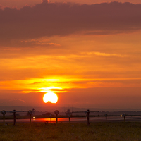 Buy canvas prints of Sunset at Liverpool Airport by Paul Madden