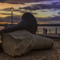 Buy canvas prints of Sculpture at sunset by Paul Madden