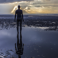 Buy canvas prints of On reflection at Crosby Beach by Paul Madden