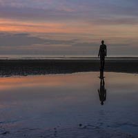 Buy canvas prints of Iron man reflection at Crosby Beach by Paul Madden