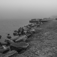 Buy canvas prints of Crosby Marina Lake in the fog by Paul Madden
